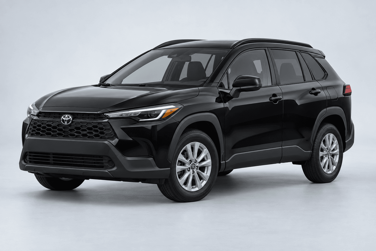 2026 Toyota Corolla Cross LE in Midnight Black Metallic, three-quarter studio view with full vehicle contained in frame