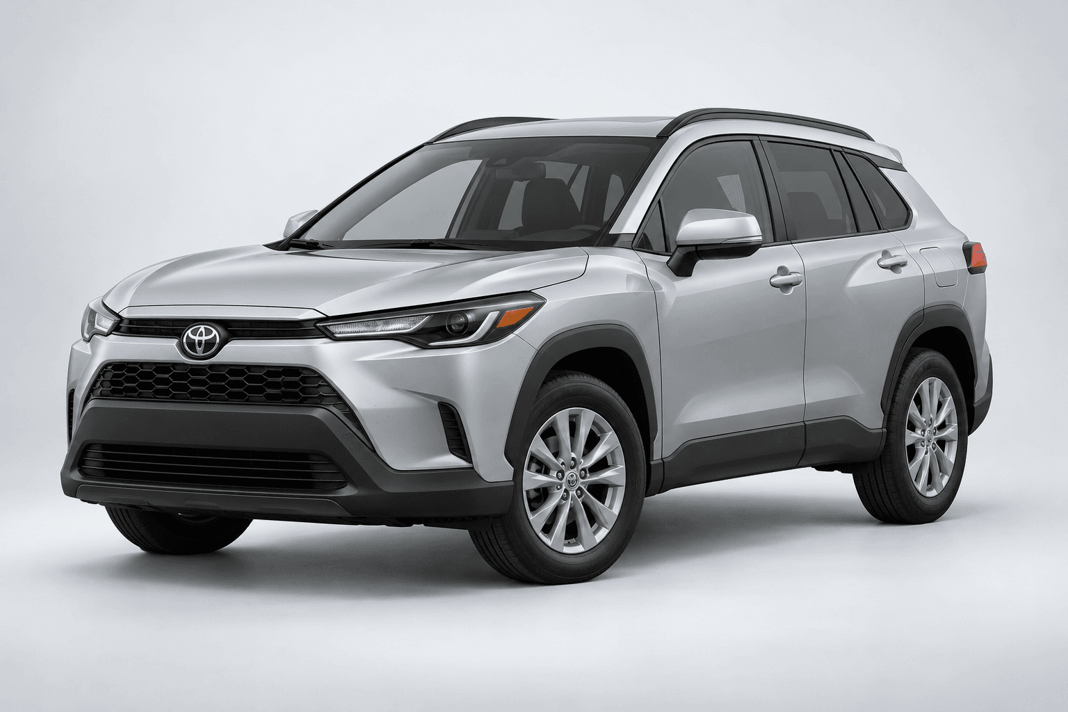 2026 Toyota Corolla Cross LE in Classic Silver Metallic, three-quarter studio view with full vehicle contained in frame